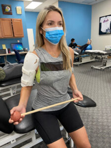 woman in physical therapy for shoulder